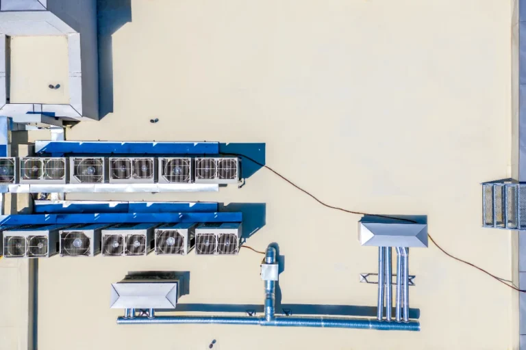 Aerial view of commercial HVAC rooftop units and ductwork for a Midland business HVAC project