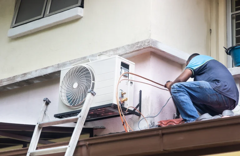AC repair technician servicing outdoor unit in Midland TX