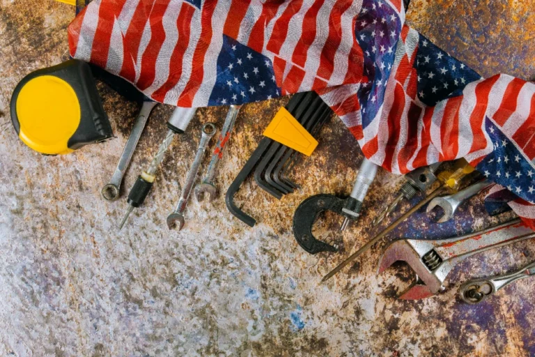 American flag and HVAC technician tools representing Independence Day AC service in Midland, Tx.