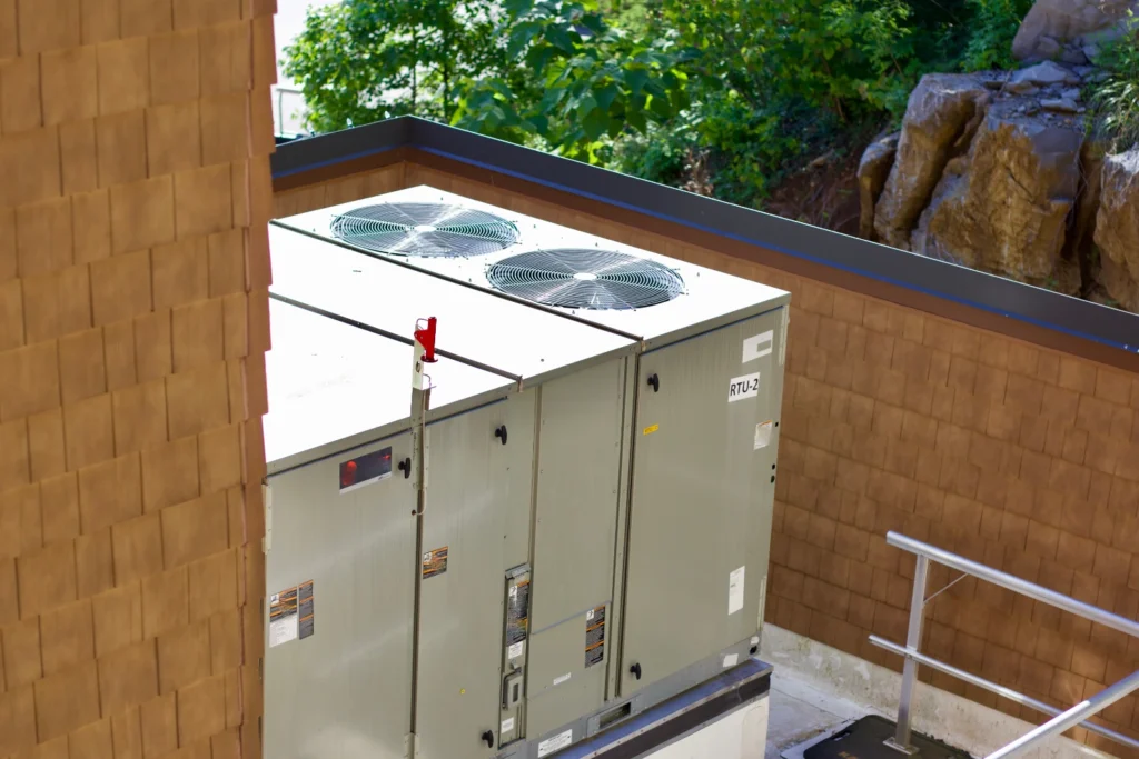 Packaged rooftop unit labeled RTU-2 serving a commercial building